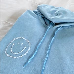 handmade light blue embroidered smiley face hoodie